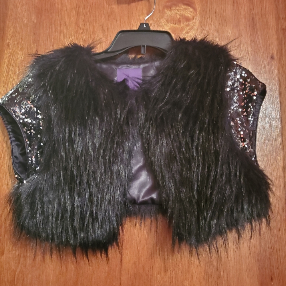 Black faux fur vest